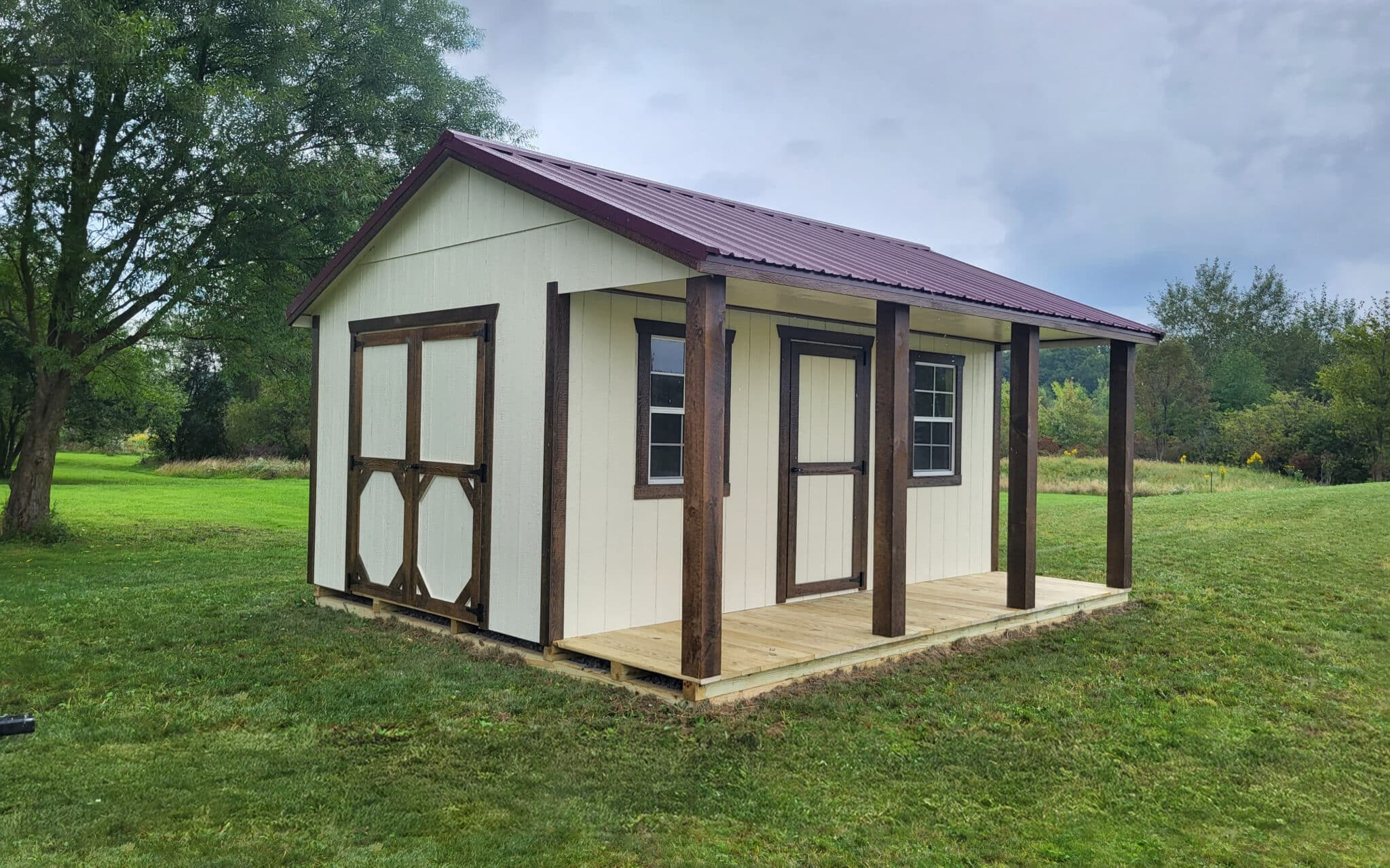 cabin style shed with porch