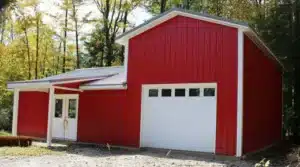 Red barn with white garage